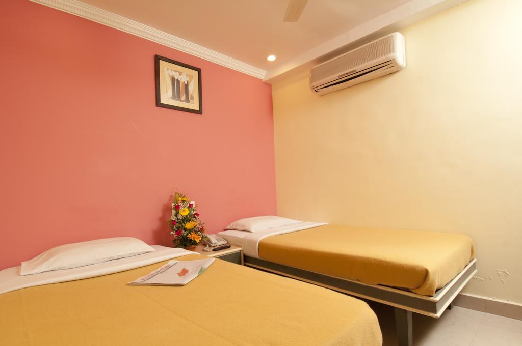 Hotel City Palace Bombaim Quarto foto